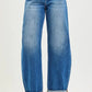 Blue faded wash wide-leg Risen jeans with rolled cuffs, plus size