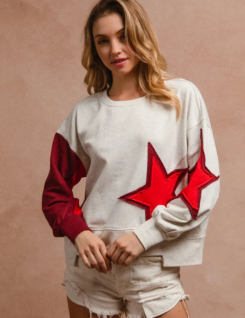 BiBi Star Patch And Spliced Hemline French Terry Long Sleeve Sweatshirt | Daverri Fashions