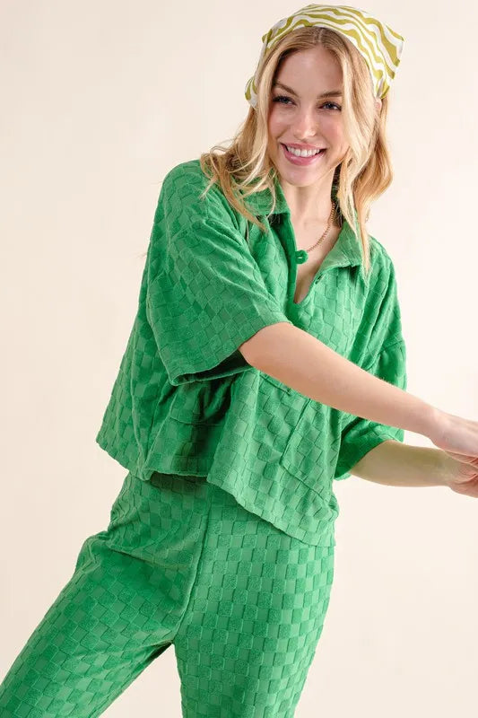 Green textured pajama set with checkerboard pattern and headband