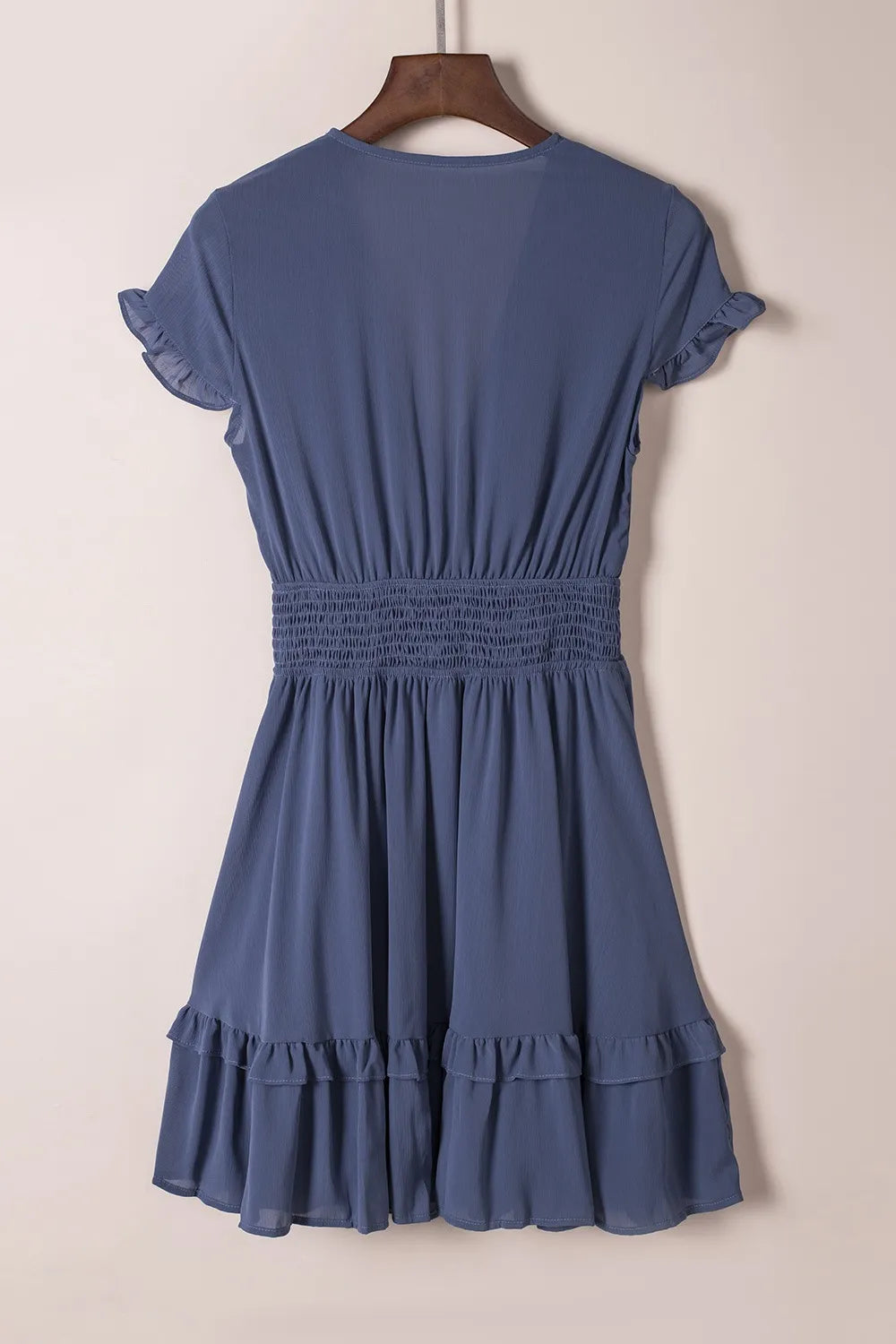 Lightweight blue chiffon tie-front mini dress with smocked waist and ruffle hem