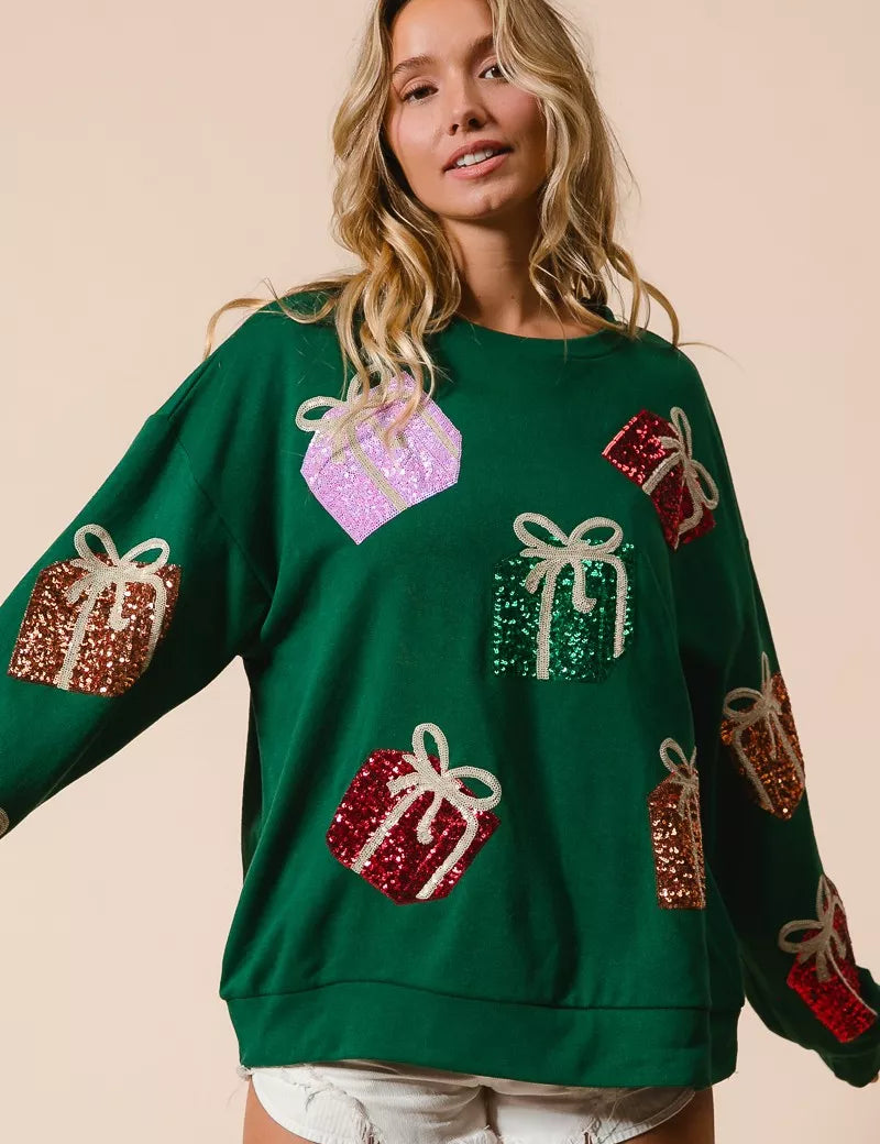 Green sequined gift box sweater with heart embroidery