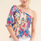 And The Why Allover Floral Print Smocked One Shoulder Blouse - DAVERRI FASHIONS