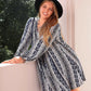 Plus size boho print V-neck long sleeve mini dress in black and white pattern