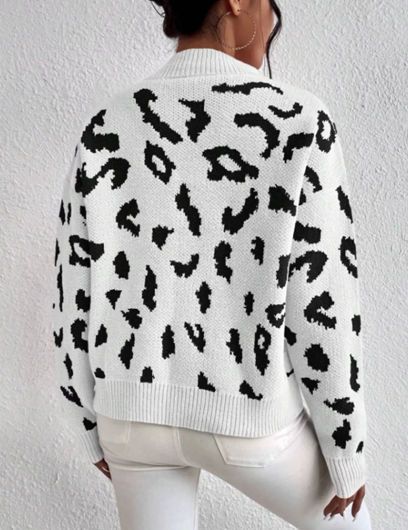 Leopard print mock neck sweater in soft knit with black spots
