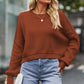 Brown cropped round neck drop shoulder sweater with ribbed cuffs and hem