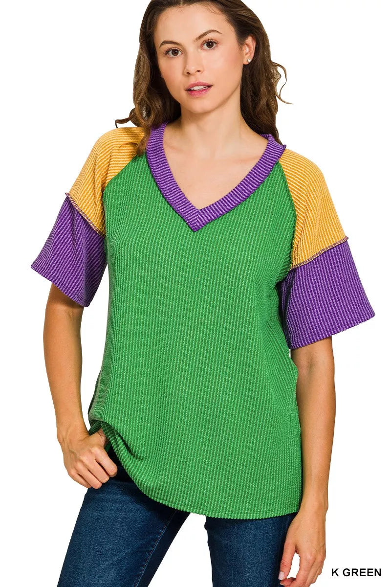 Green ribbed knit Zenana Mardi Gras top with yellow purple raglan sleeves