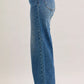 Judy Blue mid-rise jeans with tan corduroy waistband and blue denim flare legs