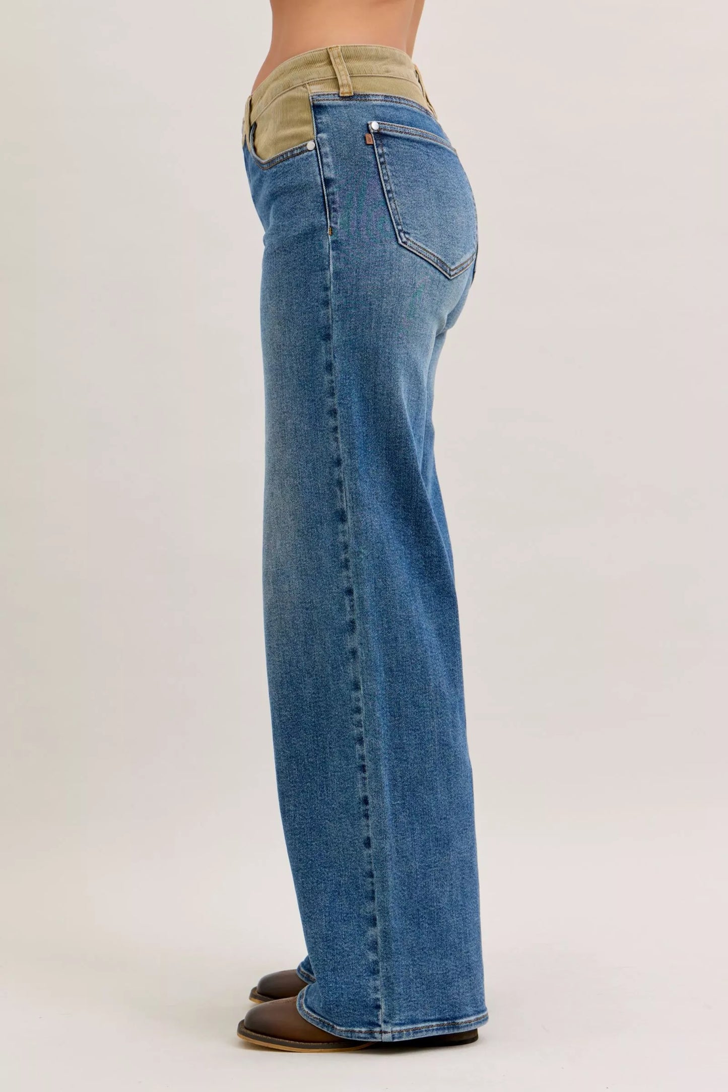 Judy Blue mid-rise jeans with tan corduroy waistband and blue denim flare legs