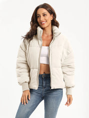 Cream zip-up turtleneck puffer jacket with fur-lined hood