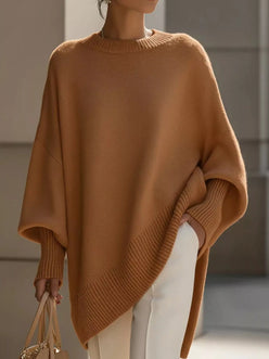 Cozy camel-colored oversized batwing sleeve knit poncho with ribbed cuffs