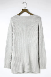 Light gray cable-knit relaxed-fit sweater with side slits and boat neck