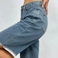 Frayed hem relaxed fit denim skirt in faded blue wash