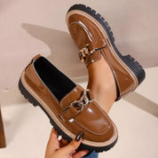 Brown patent leather chunky loafers with chain detail