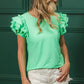 BiBi Birdseye Texture Layered Ruffle Top in vibrant mint green
