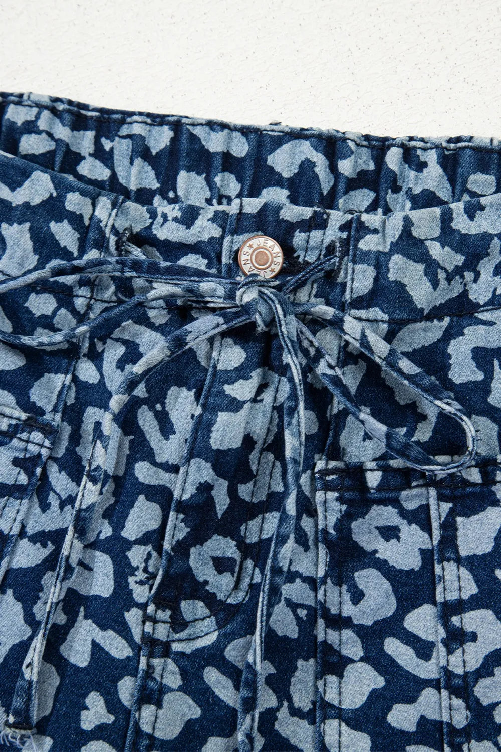 Leopard print wide leg shorts with drawstring and metallic button