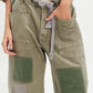 Daverri Washed Relaxed Fit Barrel Jeans in olive green patchwork denim with gray drawstring waistband