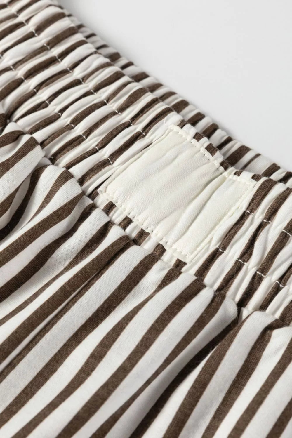 Brown and white striped elastic high waist pocketed loose pants with gathered finish