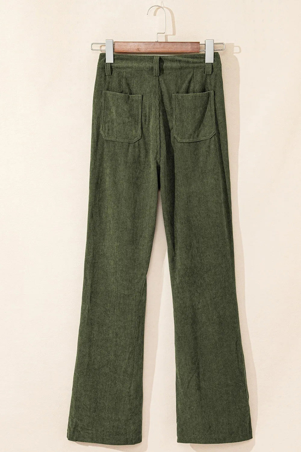 Olive green high-waist corduroy flare pants with square back pockets