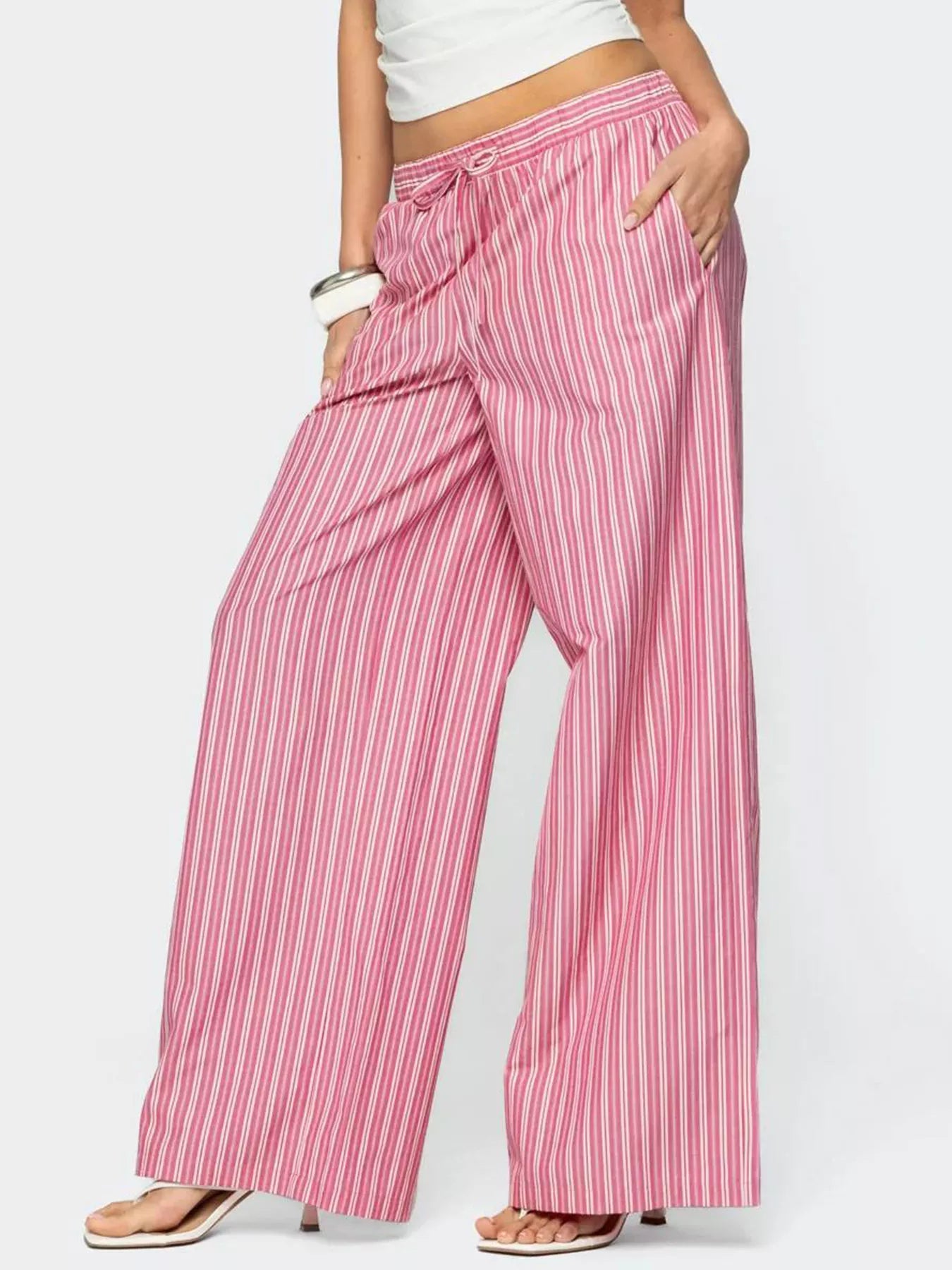 Pink and white striped wide-leg pants with drawstring waist and pockets