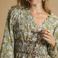 Umgee Floral Smocked Peplum Blouse with Tie Detail Blouses