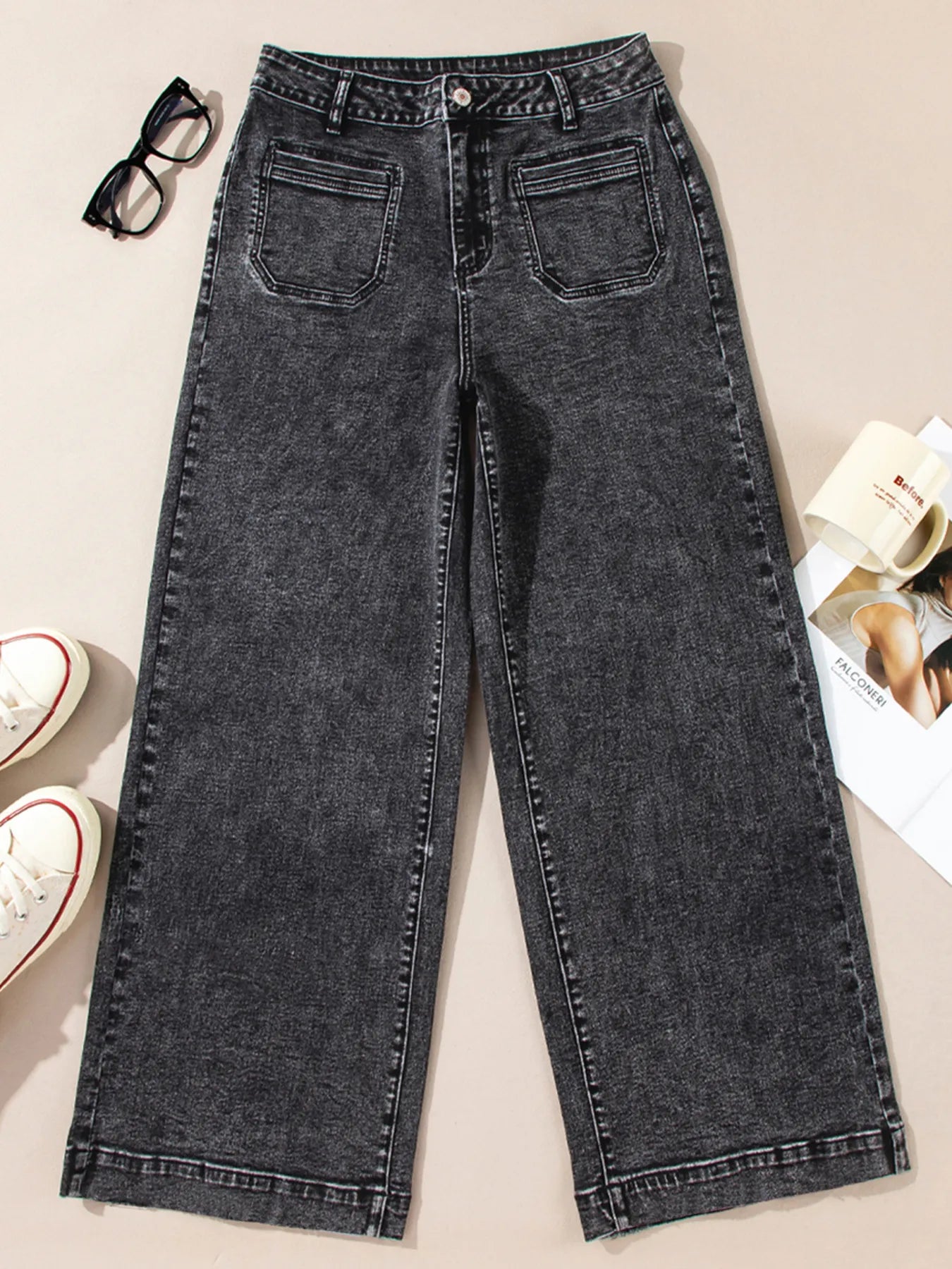 High-waisted wide-leg dark gray washed denim jeans with distressed texture