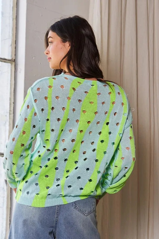 Vibrant Davi & Dani two-tone ribbed hem openwork knit top in neon green, light blue, diagonal stripes, and black polka dots
