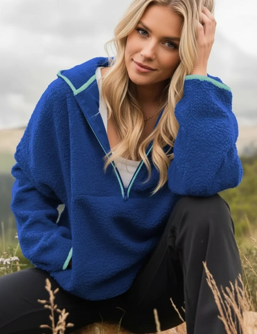 Royal blue Nike Sherpa quarter-zip hoodie with teal accents