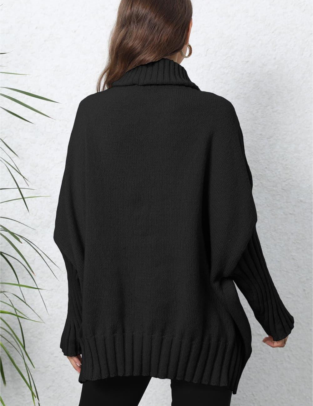 Black oversized turtleneck sweater with ribbed hem and cuffs