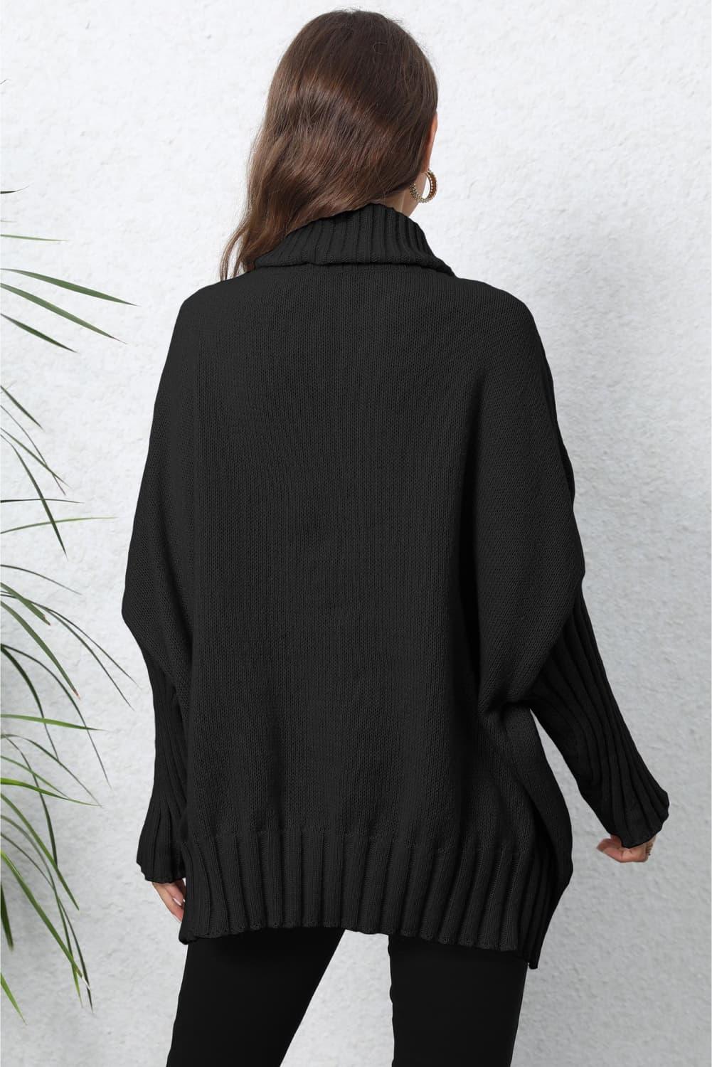 Black oversized turtleneck sweater with ribbed hem and cuffs