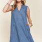 ADORA notched sleeveless denim dress in medium blue with v-neck and pockets
