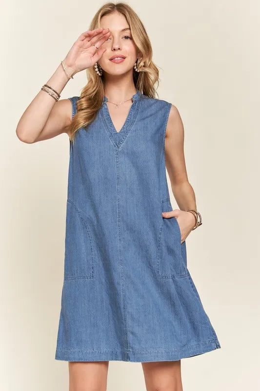 ADORA notched sleeveless denim dress in medium blue with v-neck and pockets