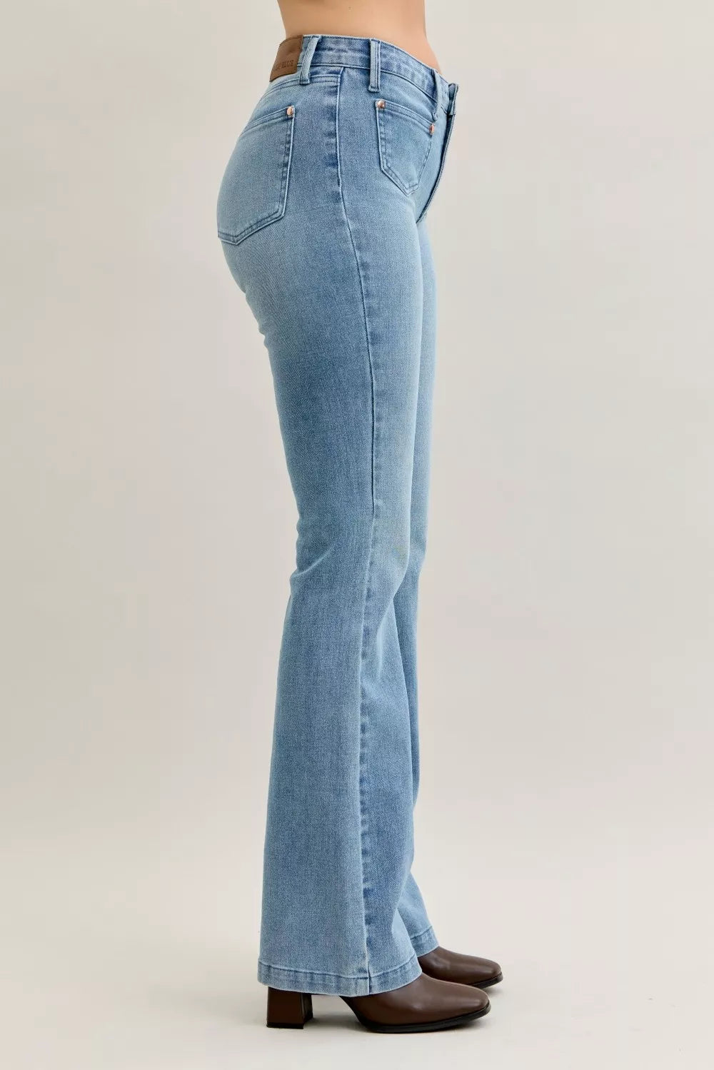 Light blue Judy Blue mid-rise bootcut jeans with brown leather boots