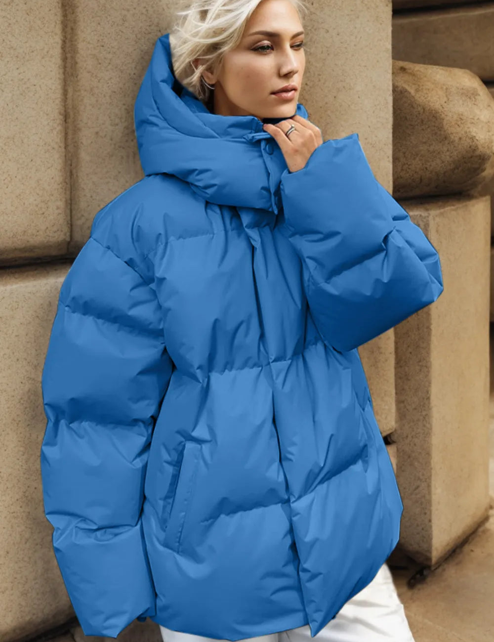 Blue pocketed zip-up hooded puffer jacket with oversized design
