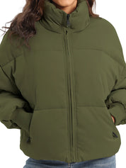 Olive green zip-up turtleneck puffer jacket with relaxed fit