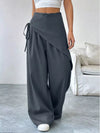 Daverri wrap-front wide-leg pants in dark gray with draped asymmetrical design