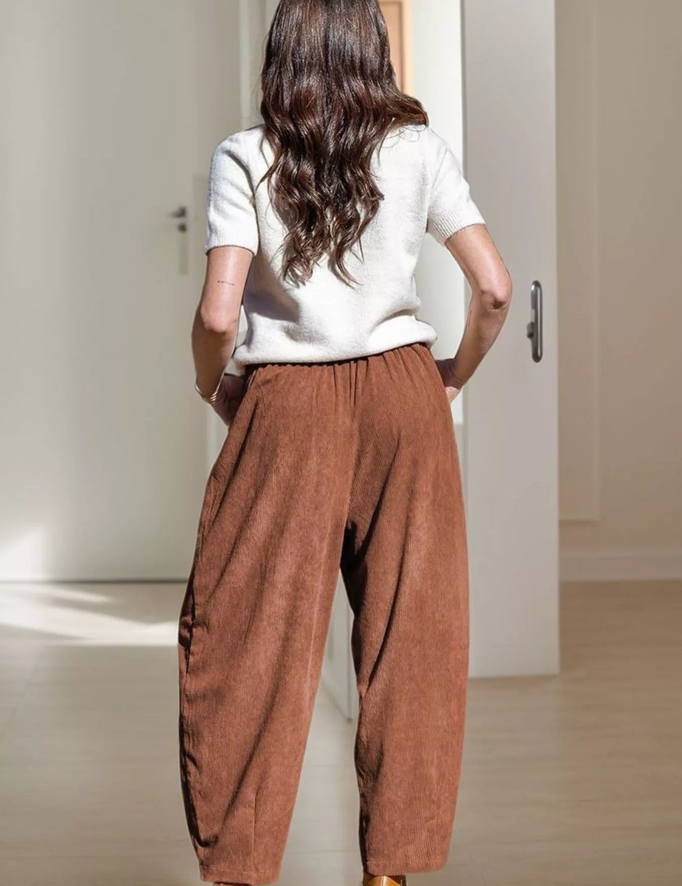 Brown linen casual wide leg pants with side slits, elastic waistband and pockets