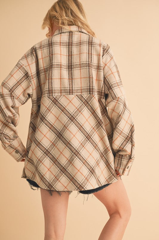 Aemi + Co Slit Plaid Half Zip Drop Shoulder Top