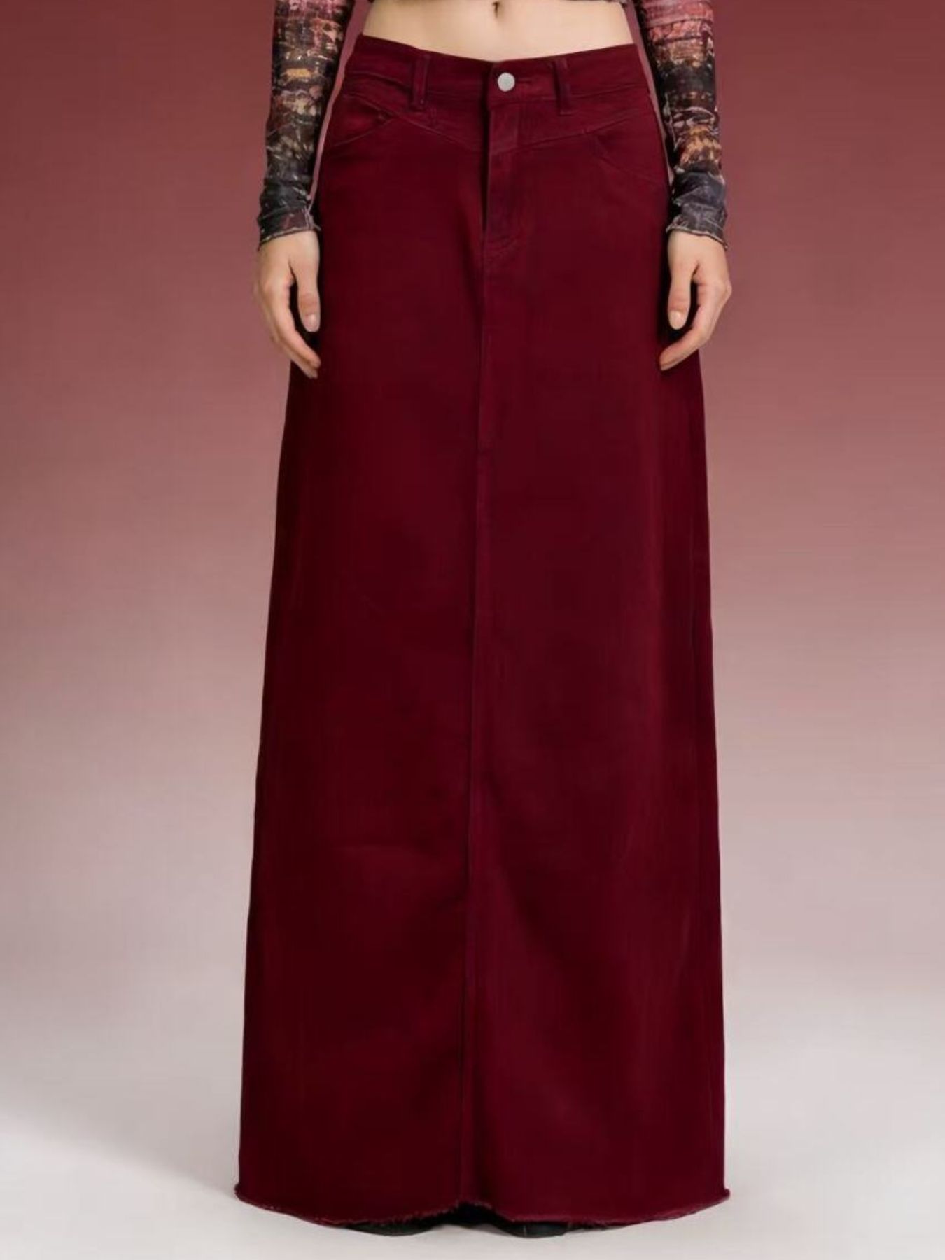 Deep red corduroy wide-leg trousers with button closure and raw hem