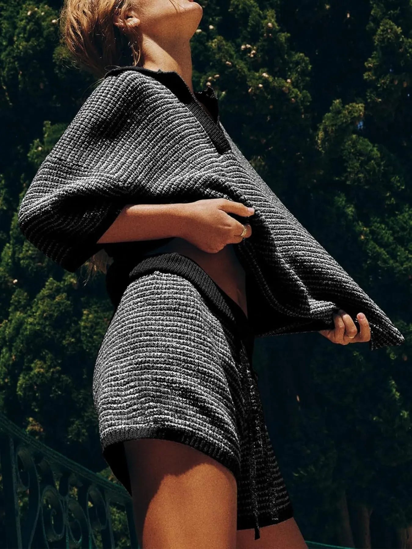 Black silver textured knit poncho with ribbed collar in striped sweater set