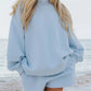 Light blue relaxed fit round neck sweatshirt with baggy sleeves