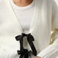 White Tie Front Knit Cardigan with black ribbon ties