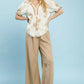 Cream-colored Umgee Paisley top with gold floral embroidery and puffed short sleeves