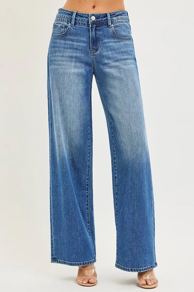 RISEN slouchy baggy high-waisted blue denim jeans with wide-leg cut and faded wash