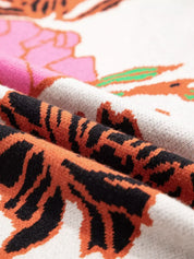 Tiger print socks with orange black stripes on white background