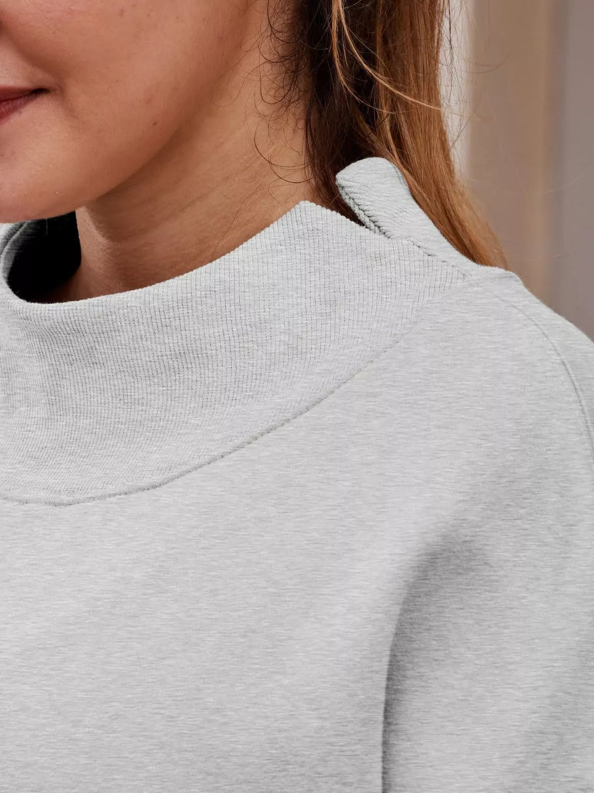 Light gray heathered mock neck dropped shoulder sweatshirt with ribbed crew neckline