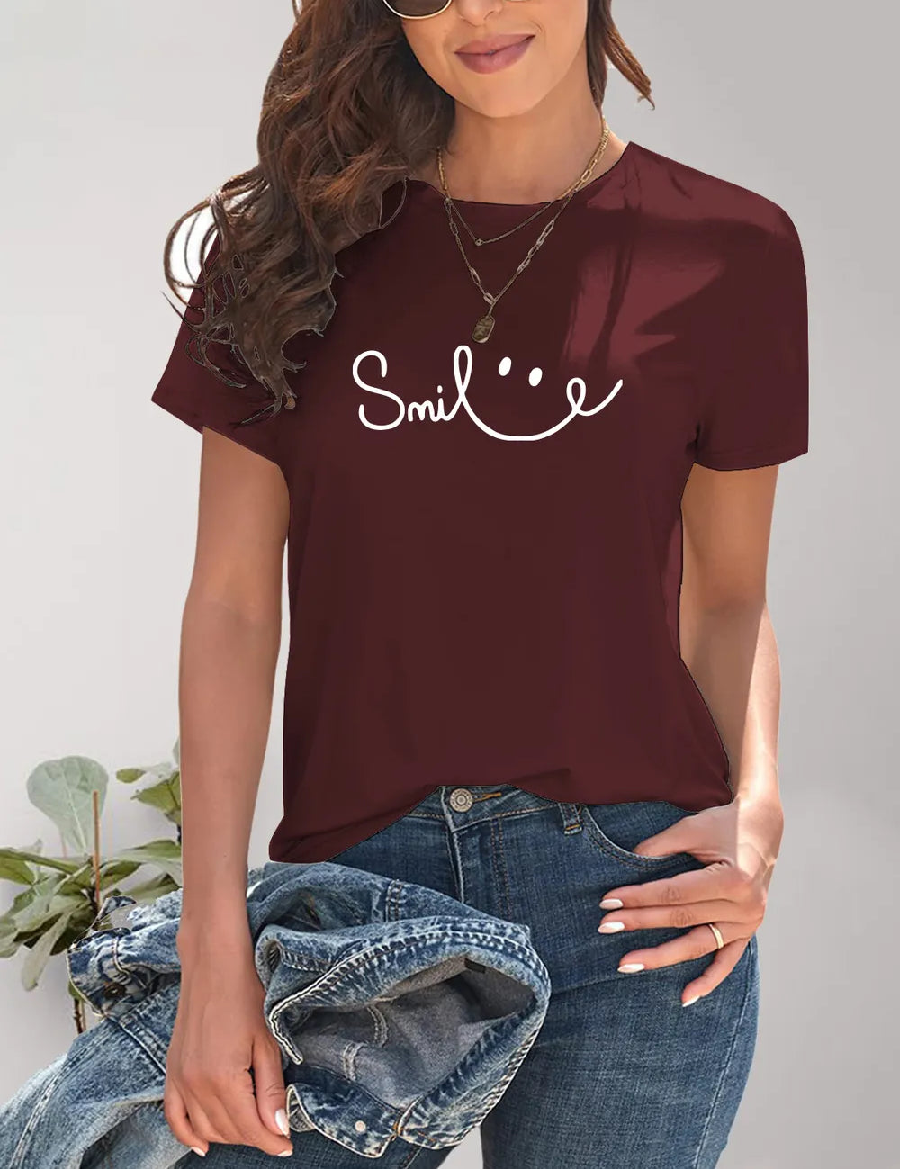 Burgundy short-sleeved SMILE t-shirt with smiley face design