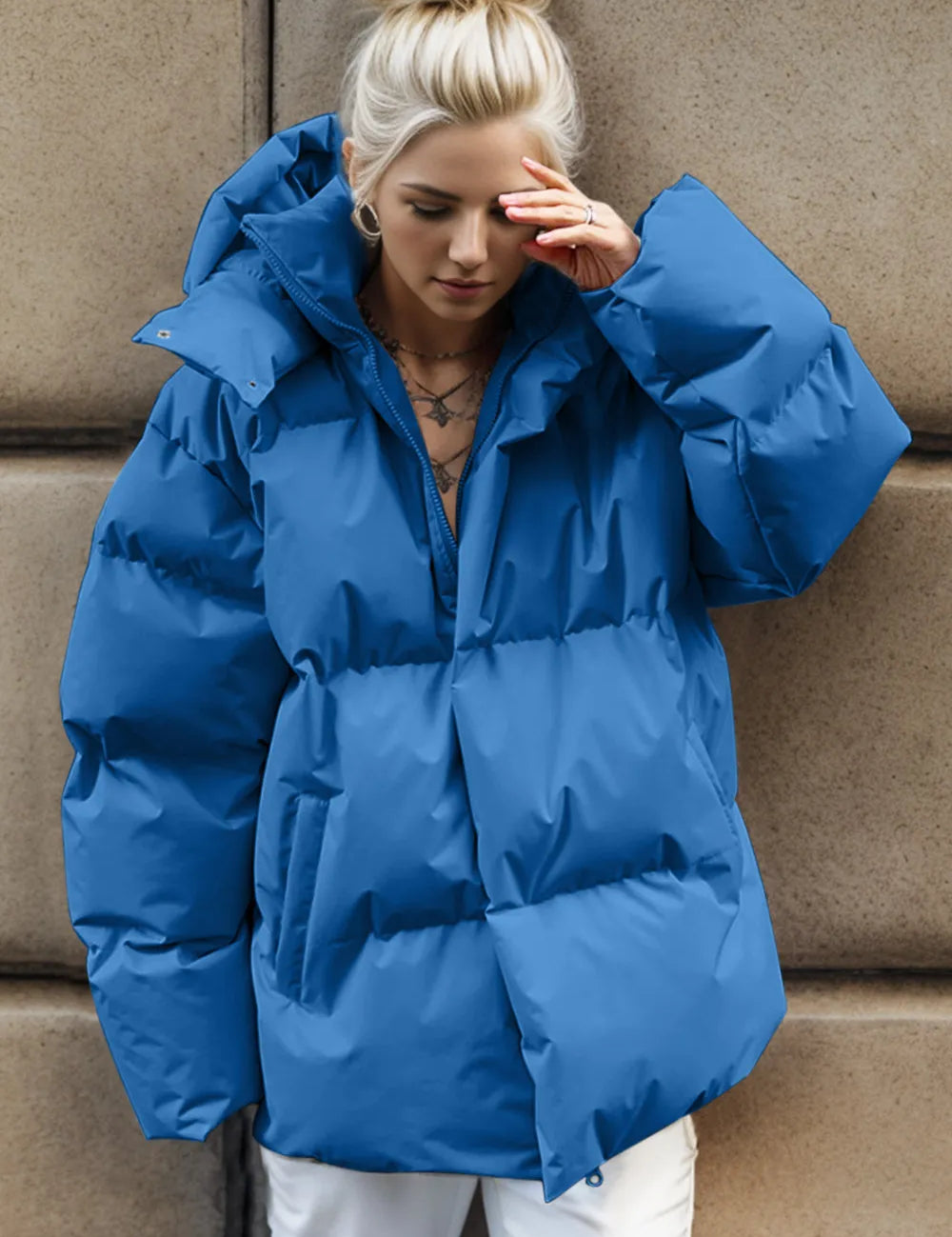 Royal blue oversized hooded puffer jacket with pockets and zip-up