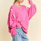 Pink oversized Davi & Dani knit top with white striped lantern sleeves