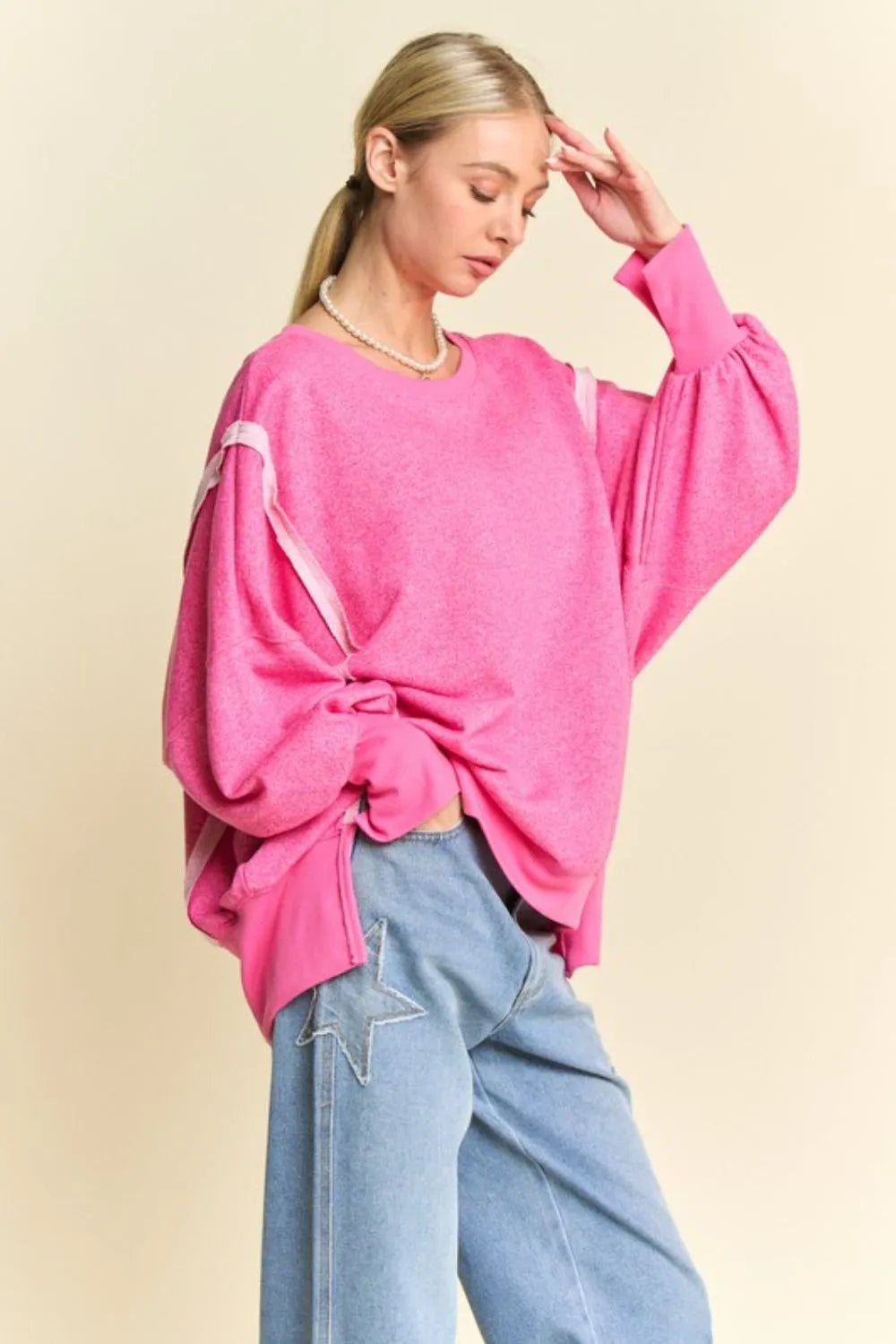 Pink oversized Davi & Dani knit top with white striped lantern sleeves