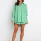 Green and white striped oversized button-down shirt dress